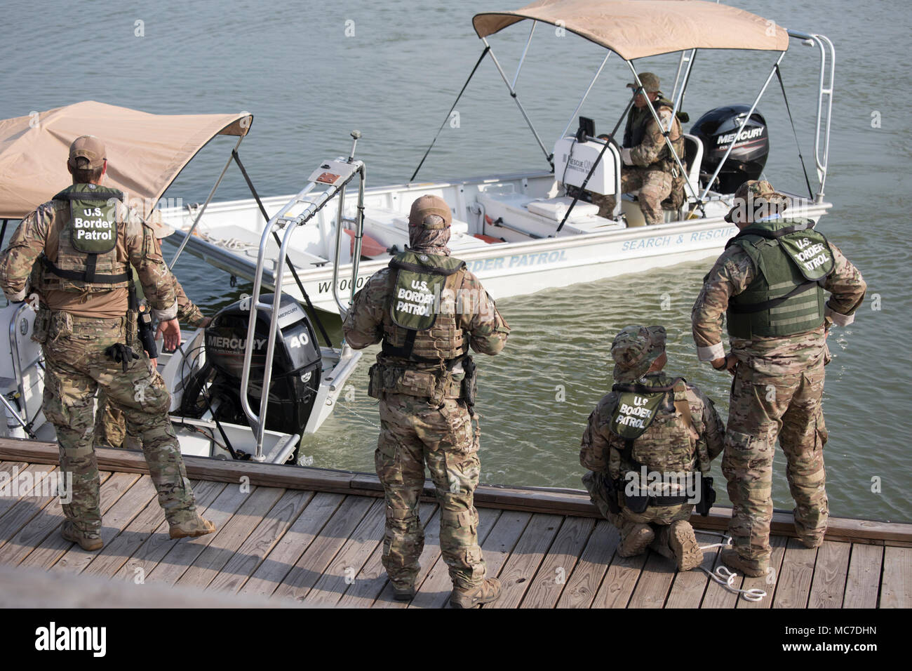 U.S. Border Patrol agents on surveillance duty on the Rio Grande River ...
