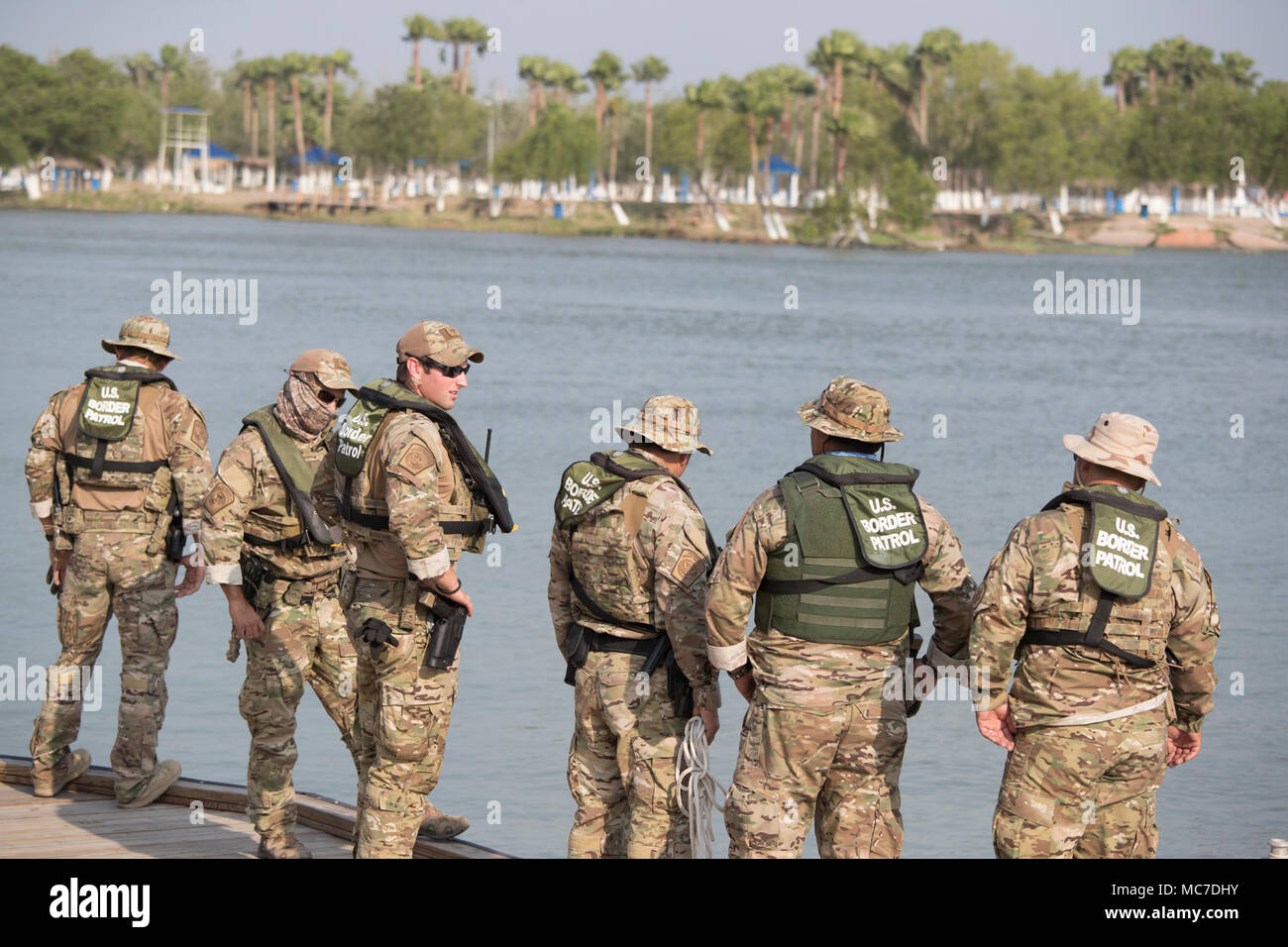 U.S. Border Patrol agents on surveillance duty on the Rio Grande River ...