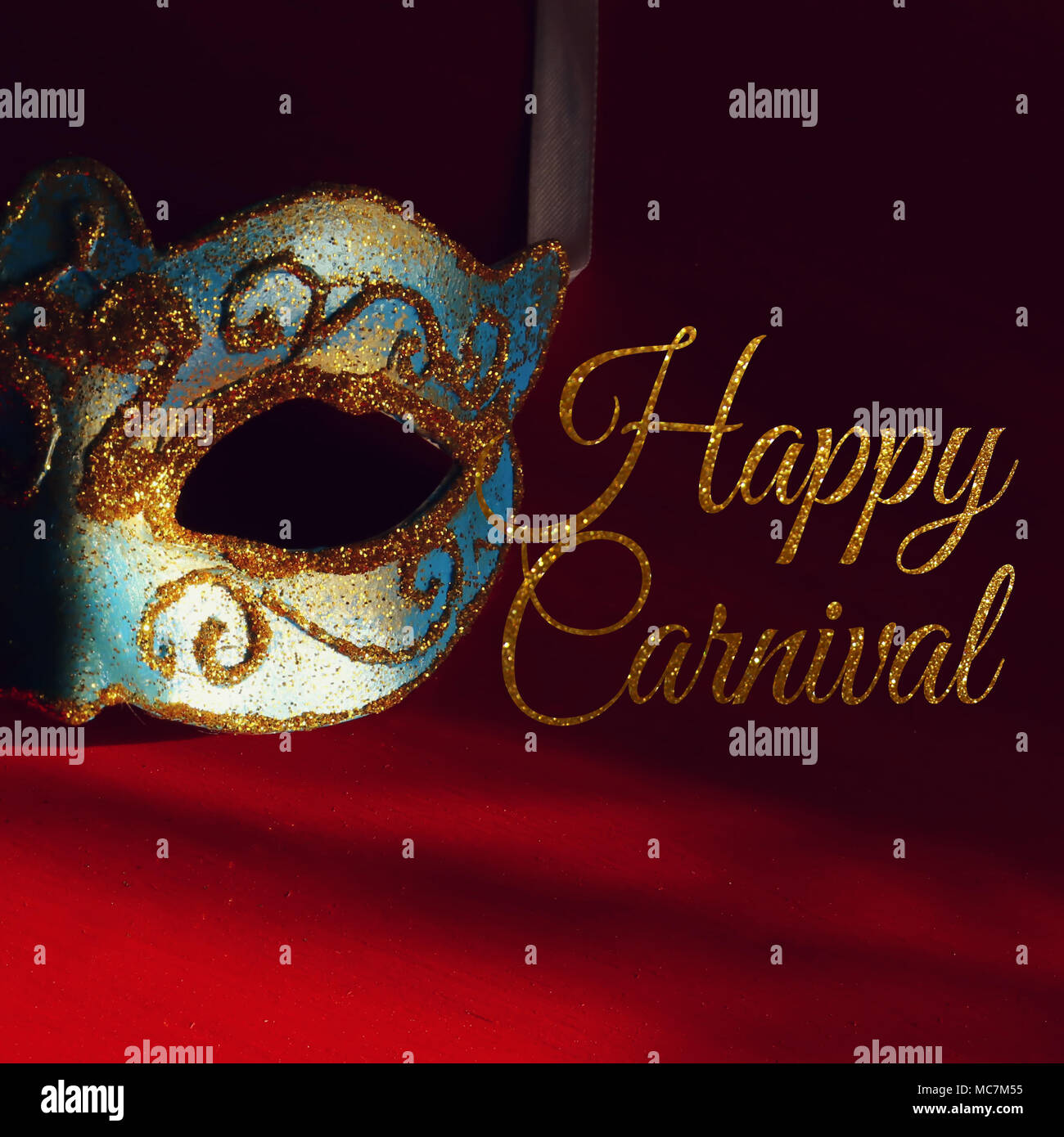 Image of elegant blue and gold venetian mask over red background Stock ...