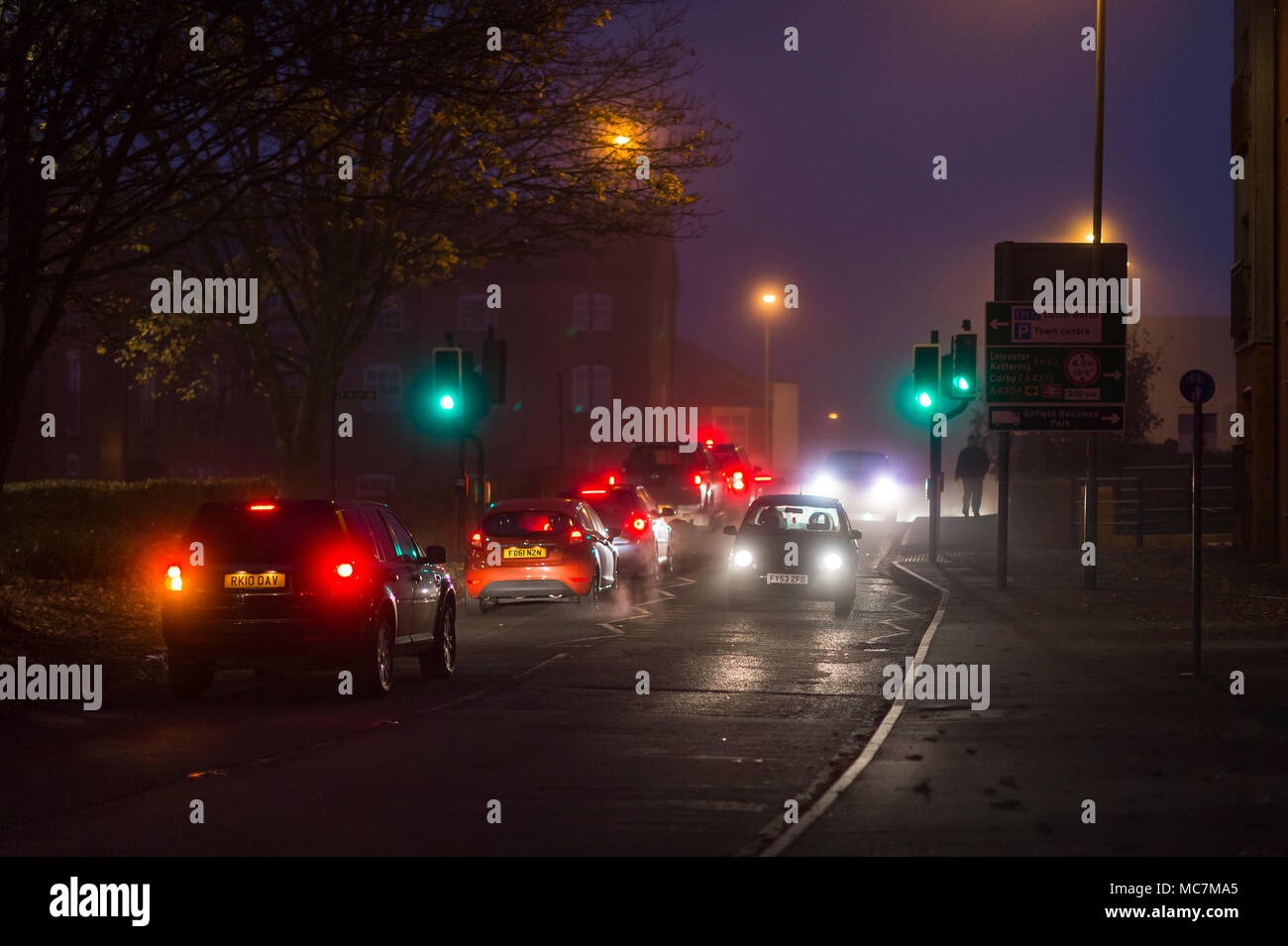Driving on foggy suburban road hi-res stock photography and images - Alamy