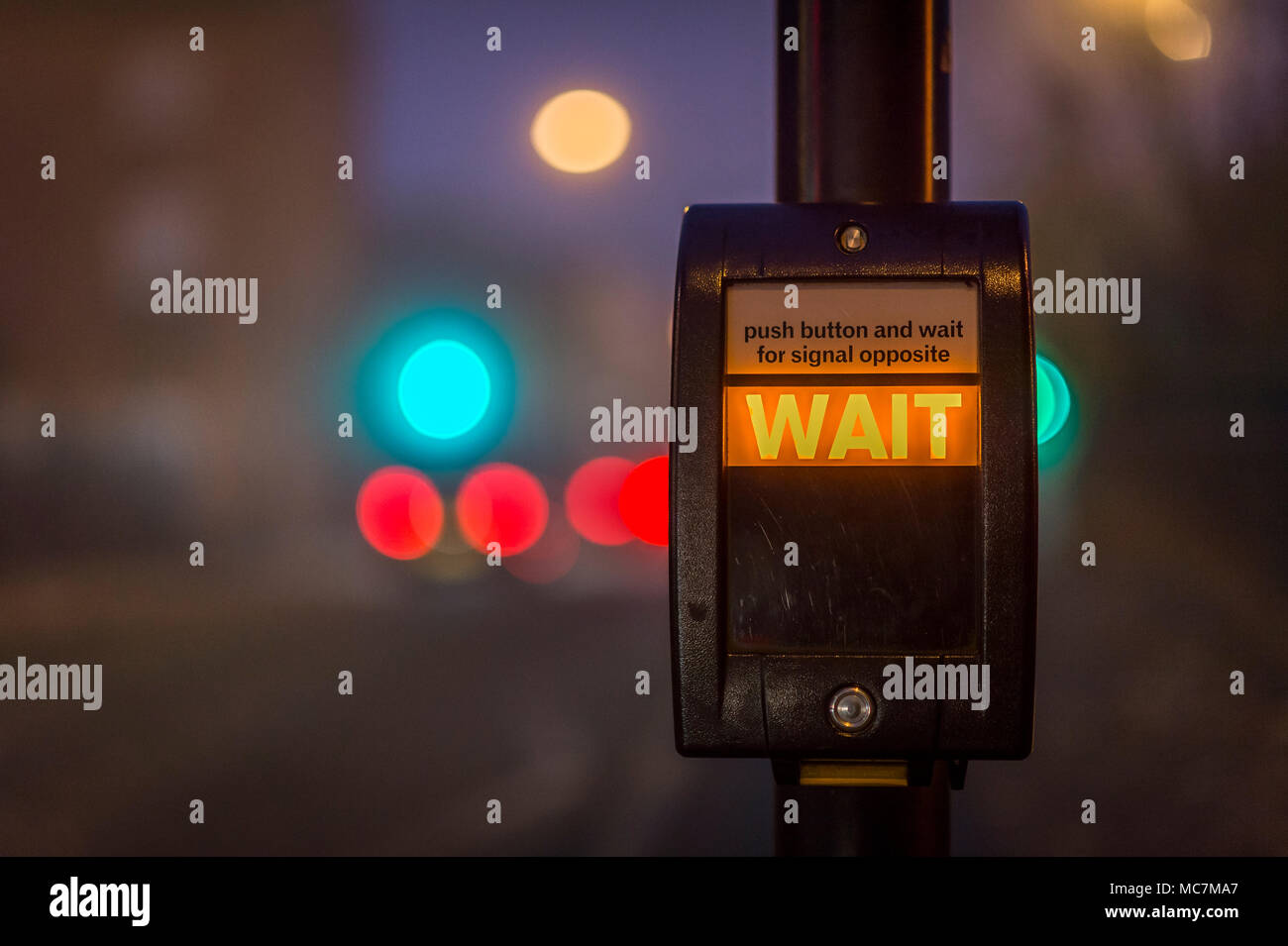 Pedestrian call button at a crossing in the UK. Stock Photo