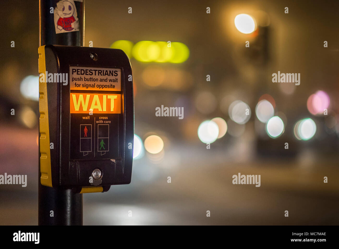 Pedestrian call button at a crossing in the UK. Stock Photo
