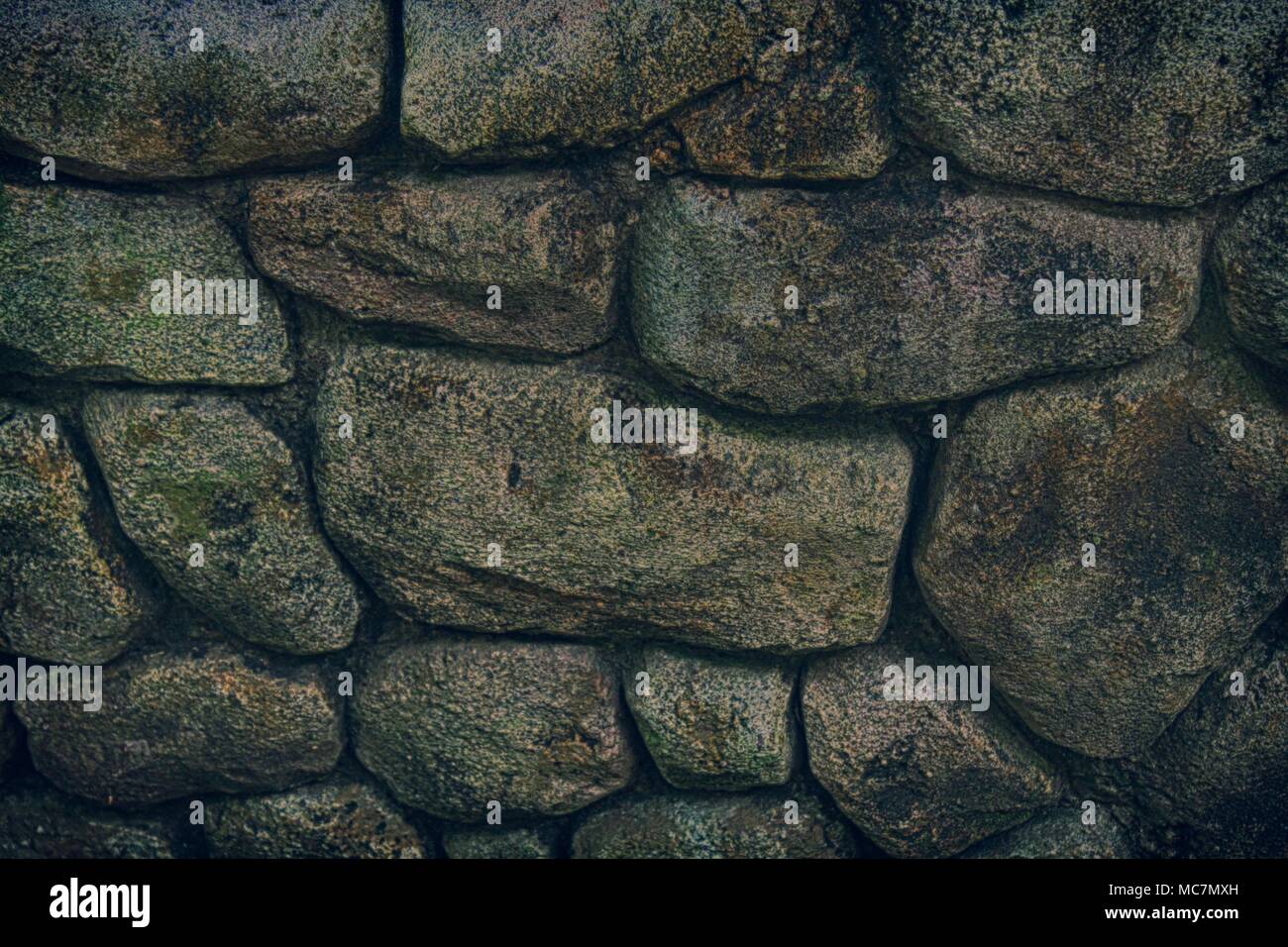 Stone wall for background or rocks rough texture Stock Photo - Alamy