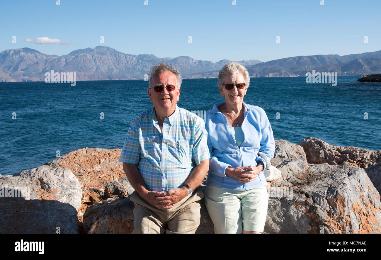 Elderly couple on holiday at the seaside in Crete, Greece. Summer 2017 Stock Photo