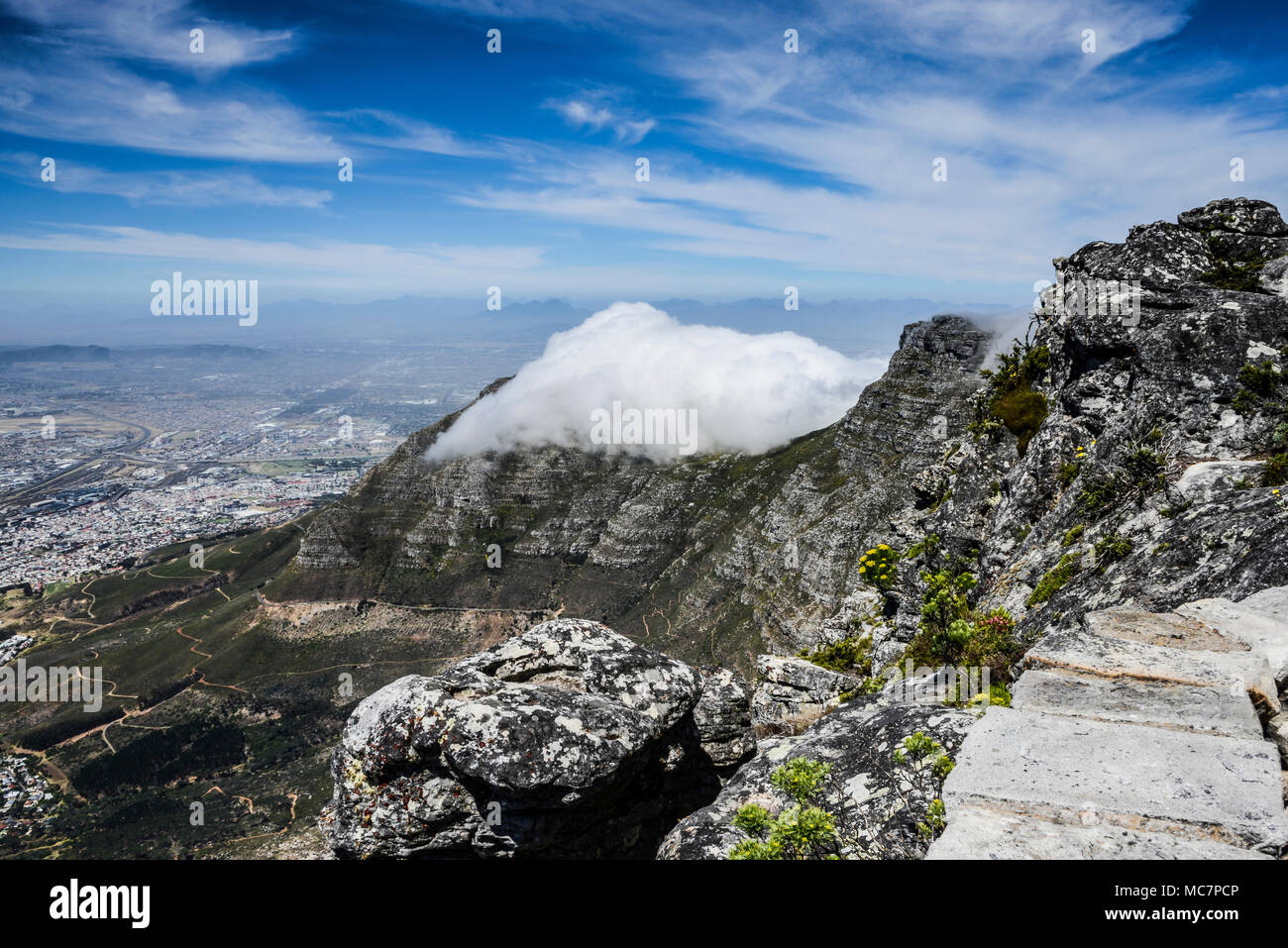 Cloud sitting on top of Devil's Peak seen from Table Mountain, Cape ...