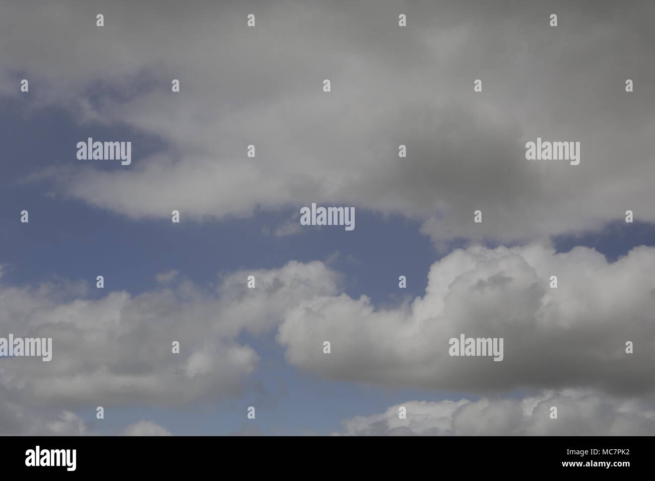 Clouds in the sky in many shapes Stock Photo - Alamy