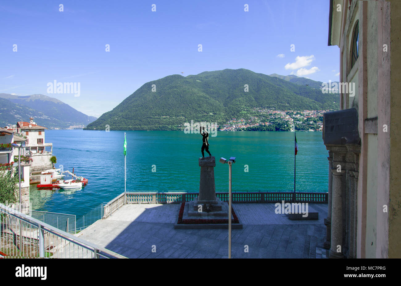 square of the church of a small village of Como lake with beautiful landscape, Italy Stock Photo