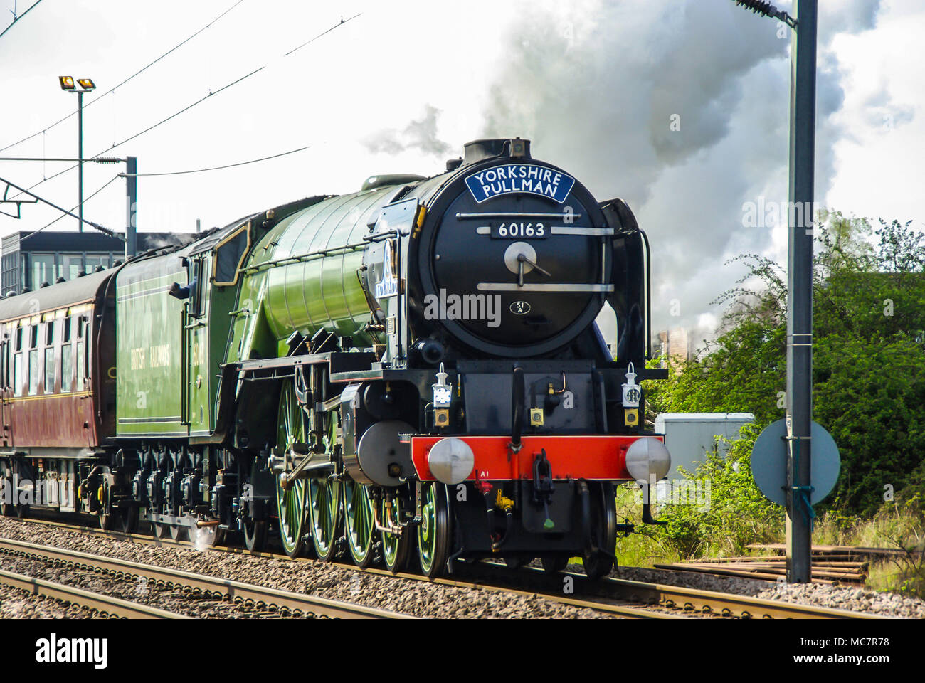 60163 Tornado new built steam locomotive pulling Yorkshire Pullman to York. Completed in 2008 it often runs on UK mainline rails. Space for copy Stock Photo