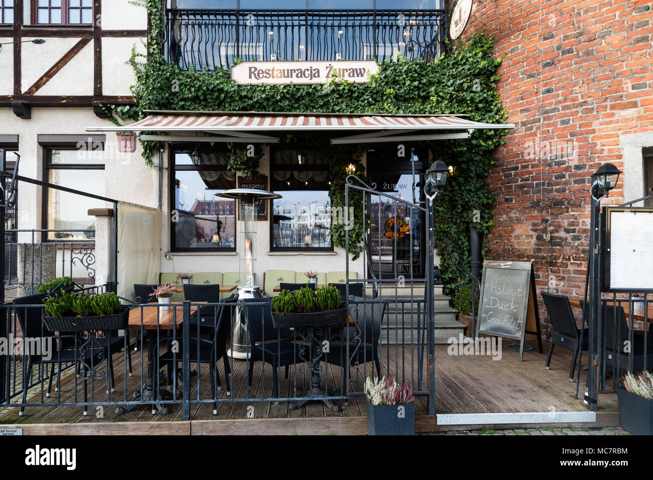 Exterior of a restaurant in Gdansk on the canal in the old town Stock Photo