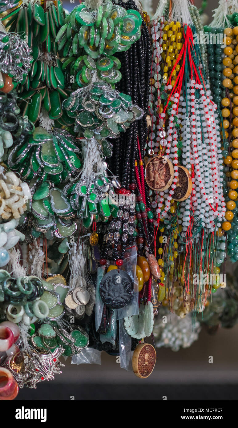 Chinese traditional accessories and popular authentic decorative elements in South East Asia. Outdoor souvenir market in Hong Kong. Travel concept. Stock Photo