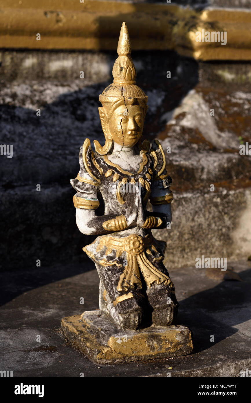 Folded hands kneeling hi-res stock photography and images - Alamy