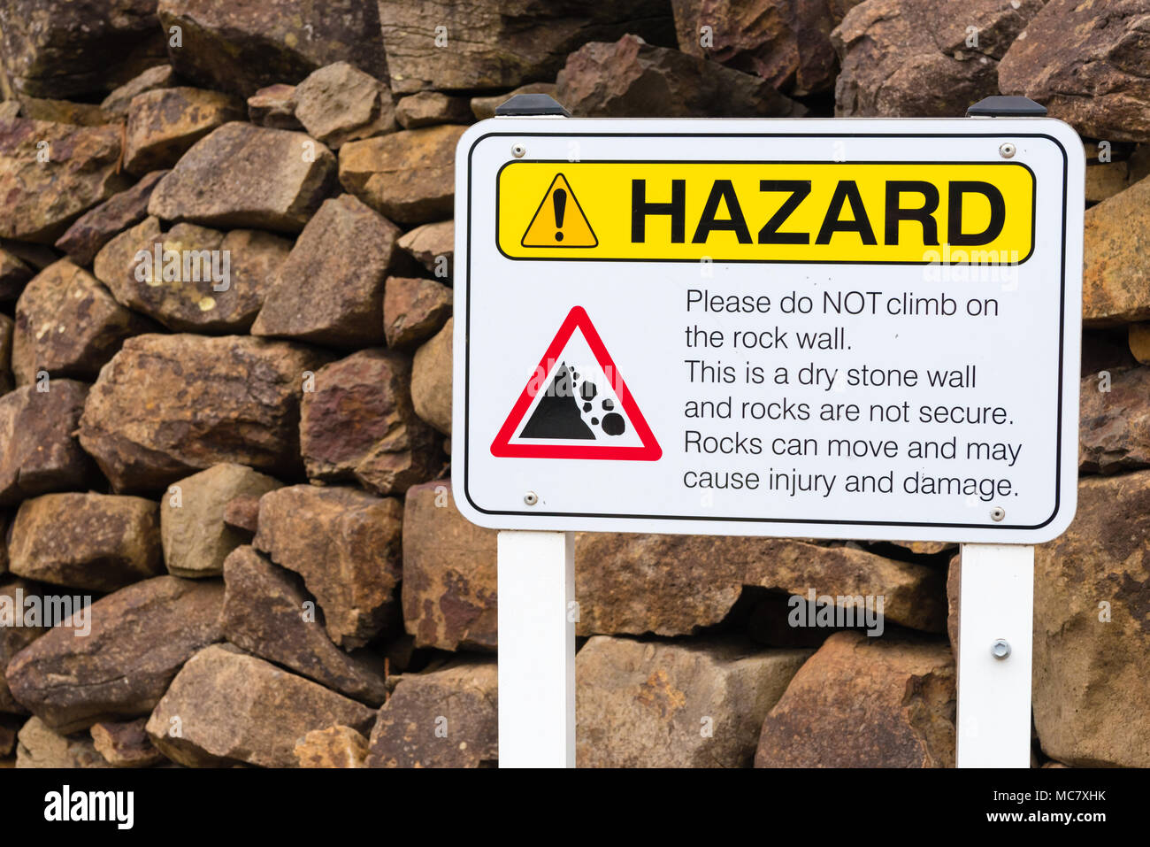 Do not climb on the rocks warning sign Stock Photo Alamy