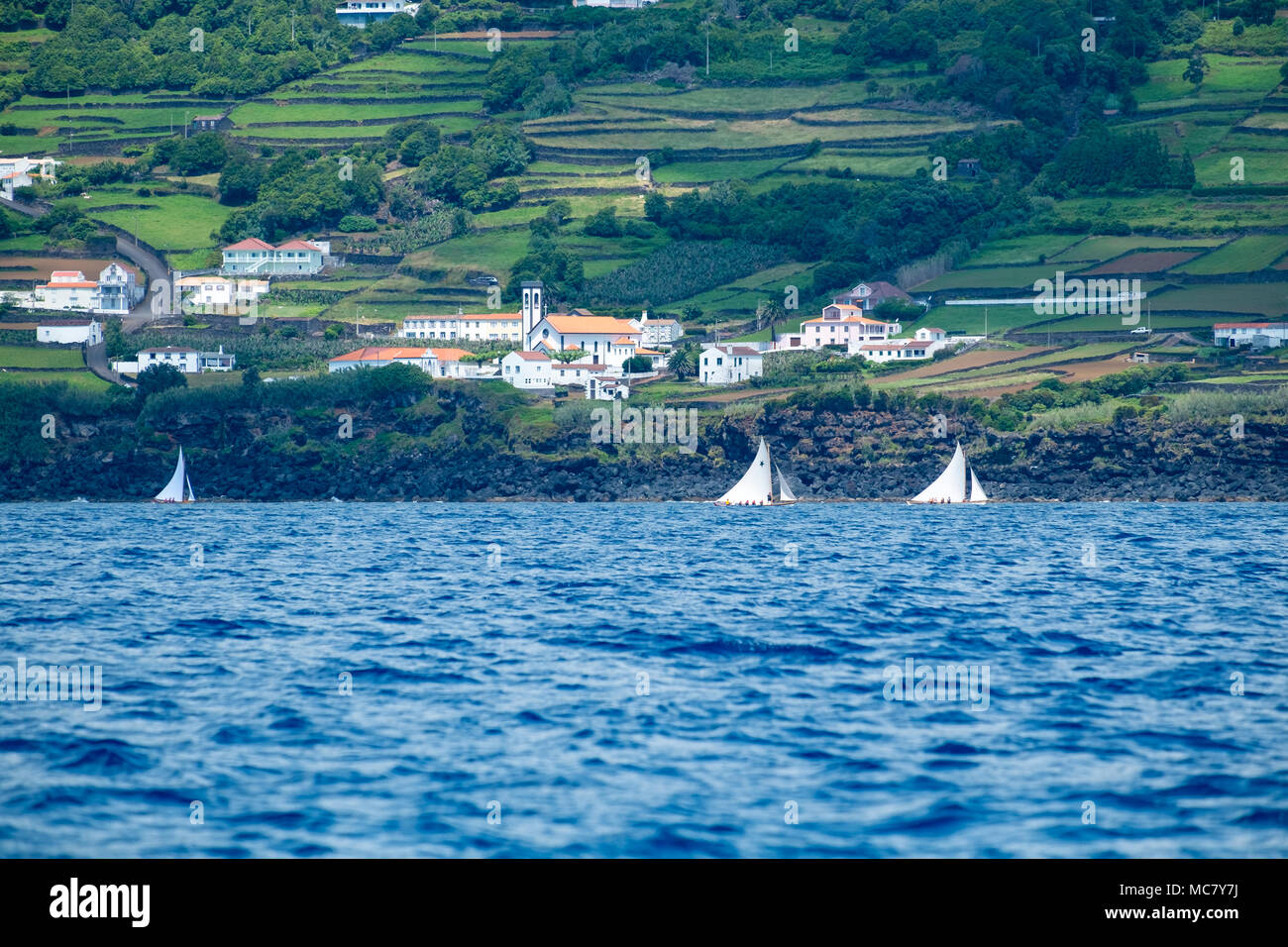 Traditional whaling boats now used for leisure sailing in the Azores Stock Photo