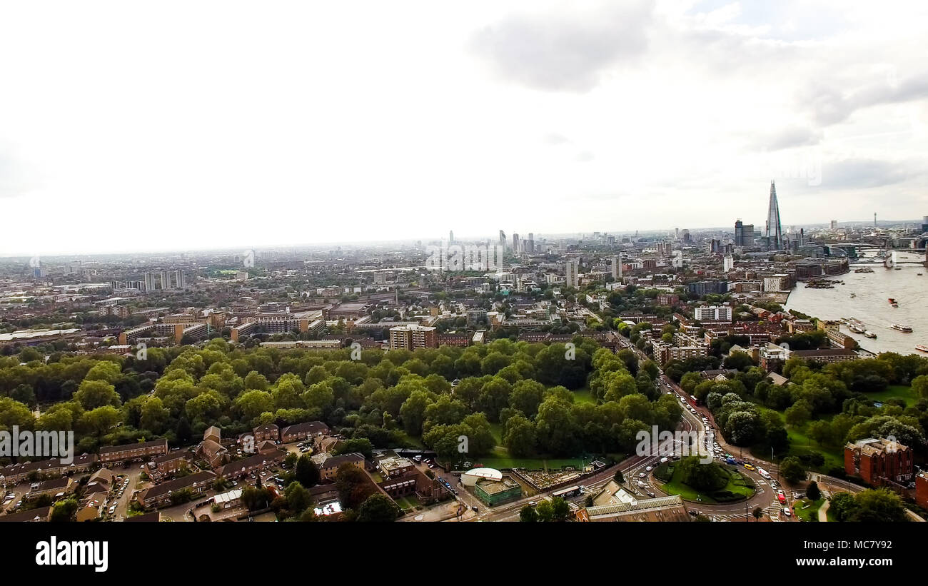 Aerial London Urban Cityscape around South of the City Neighborhood Bermondsey, Elephant & Castle Above Southwark Park Stock Photo