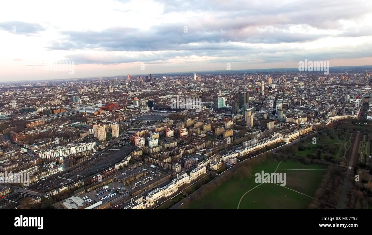 Aerial View London Cityscape with Dusk Sunset Sky around Regent's Park, Camden Town Central City Town Neighborhood Skyline in England, UK Stock Photo