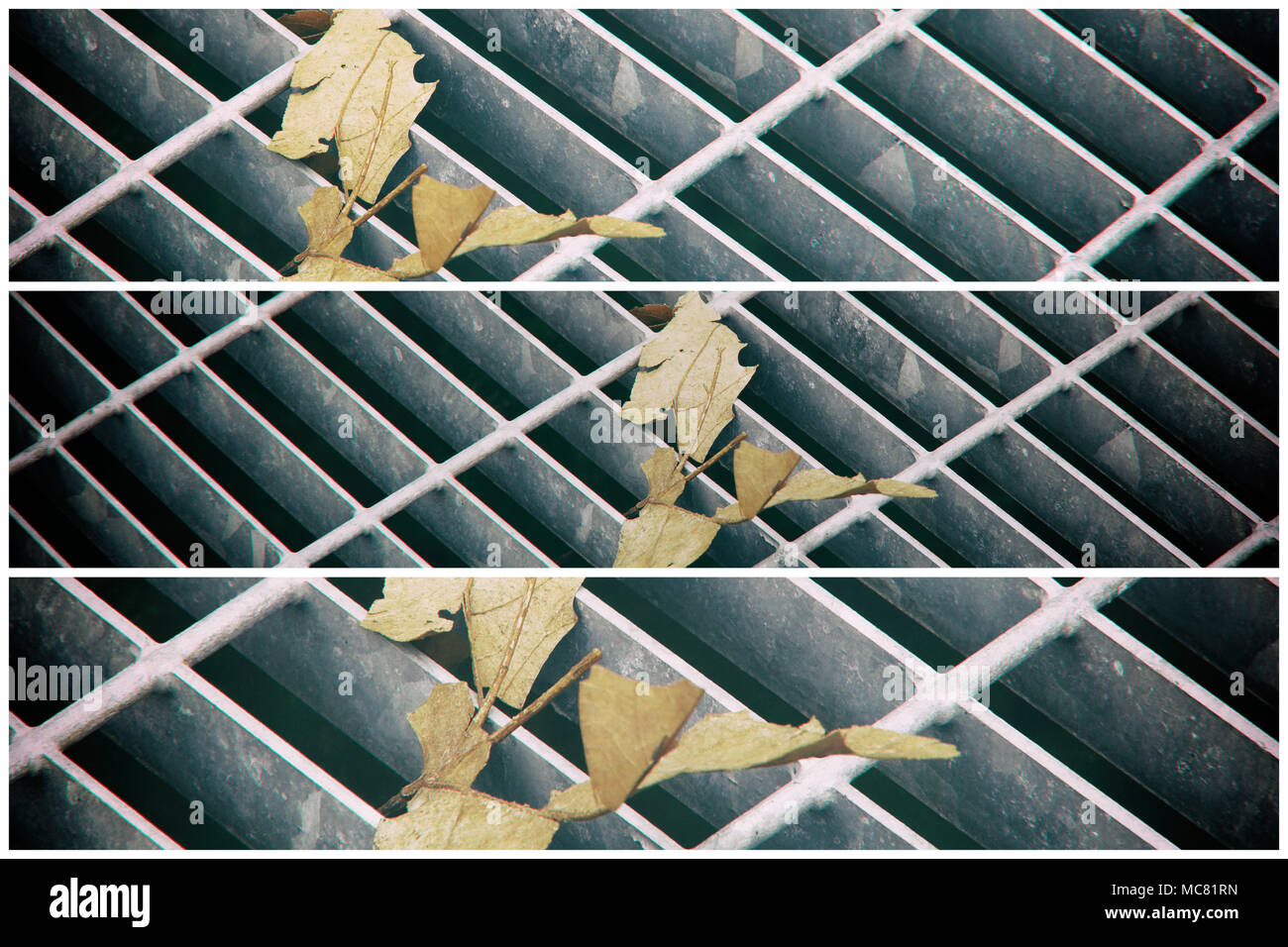 Square metal hatch in urban pavement, sewer manhole cover with marking lines and leaf inside. Stock Photo