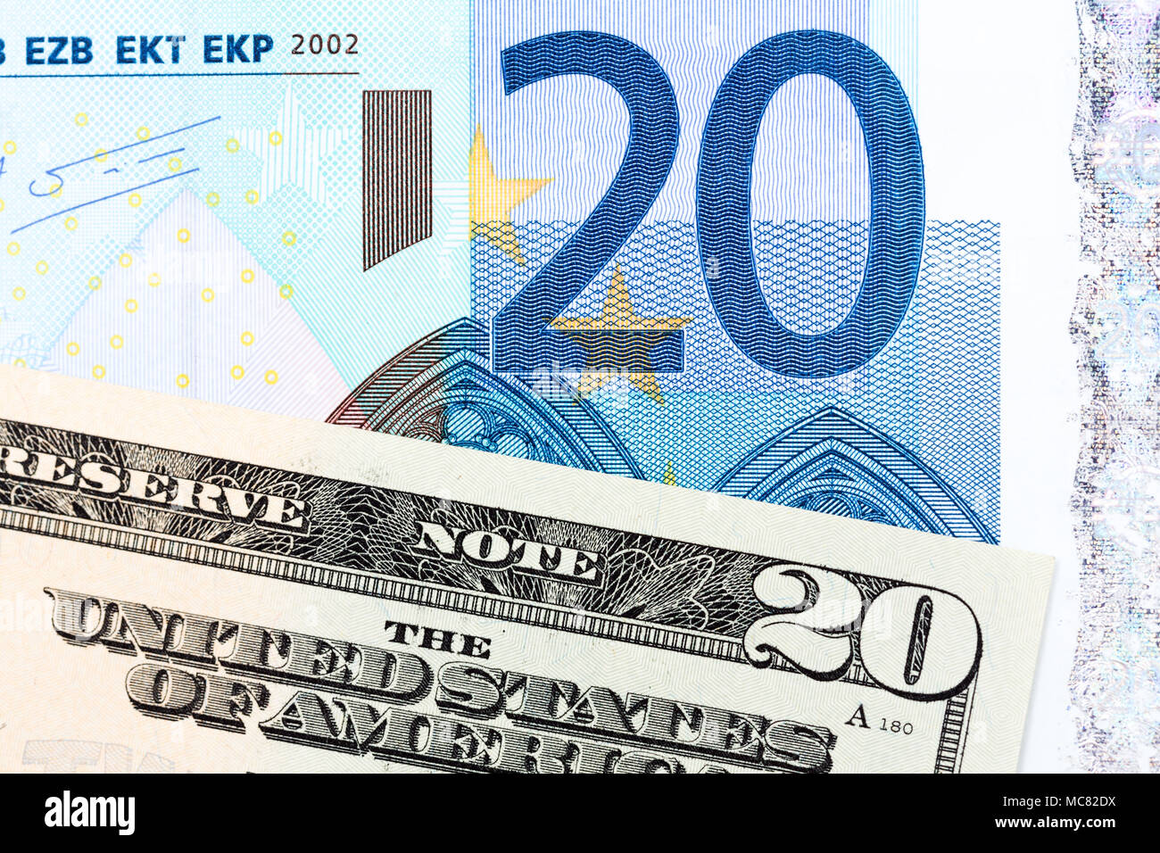 Twenty dollar and twenty euro banknotes. Stock Photo