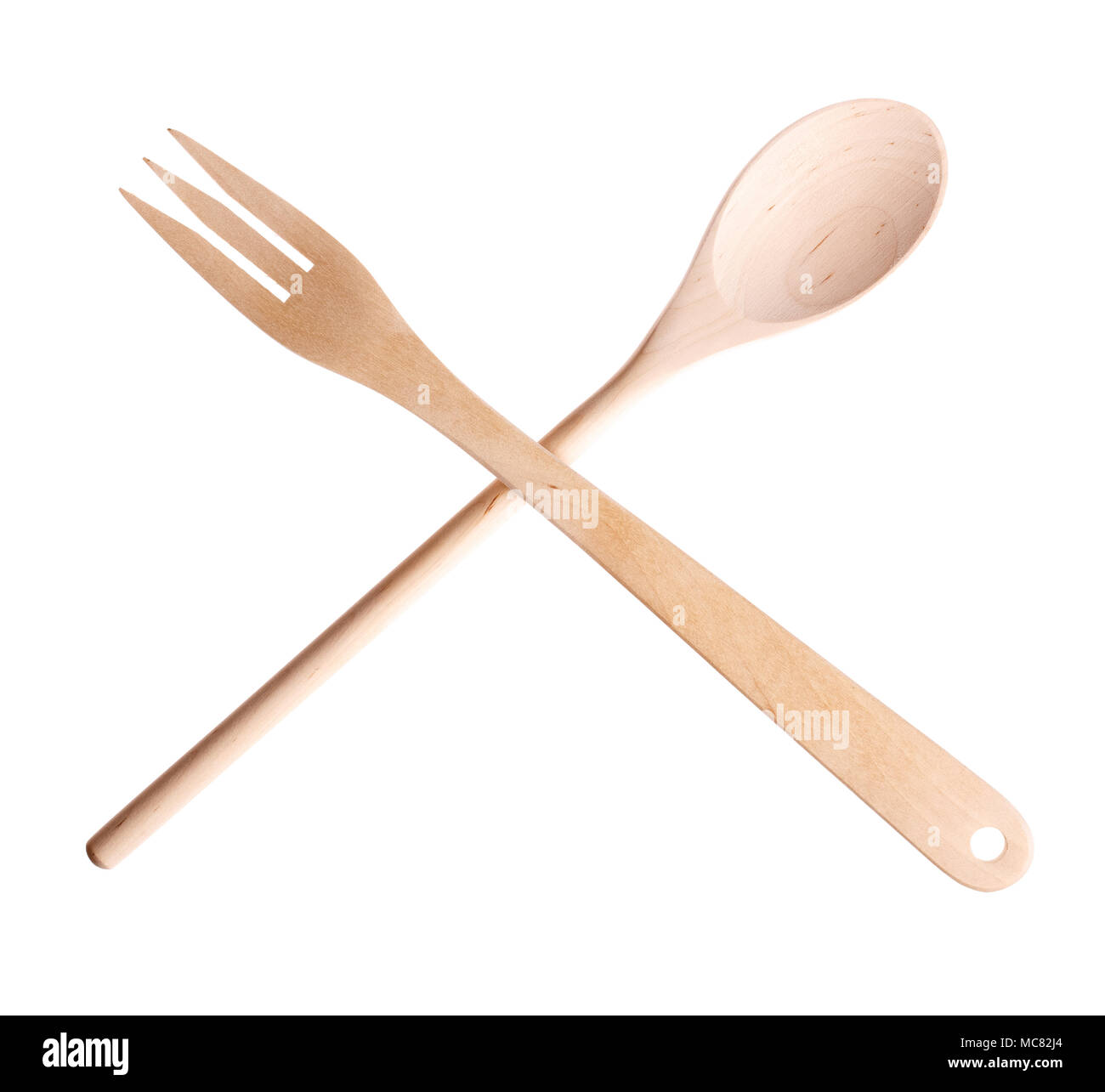 Wooden fork and spoon on a white background. Stock Photo