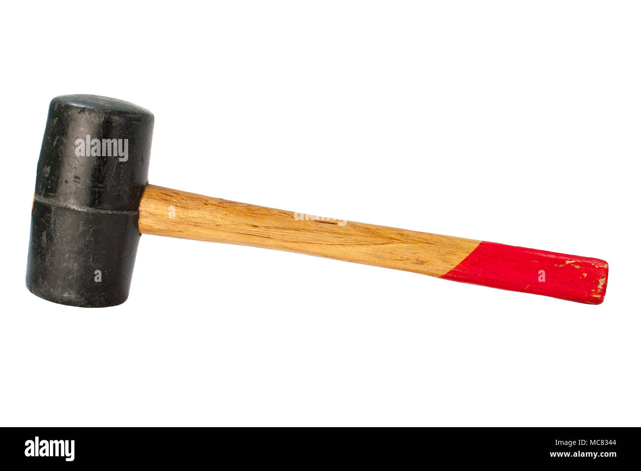 used black Rubber Mallet with red wooden handle isolated on white background. Stock Photo