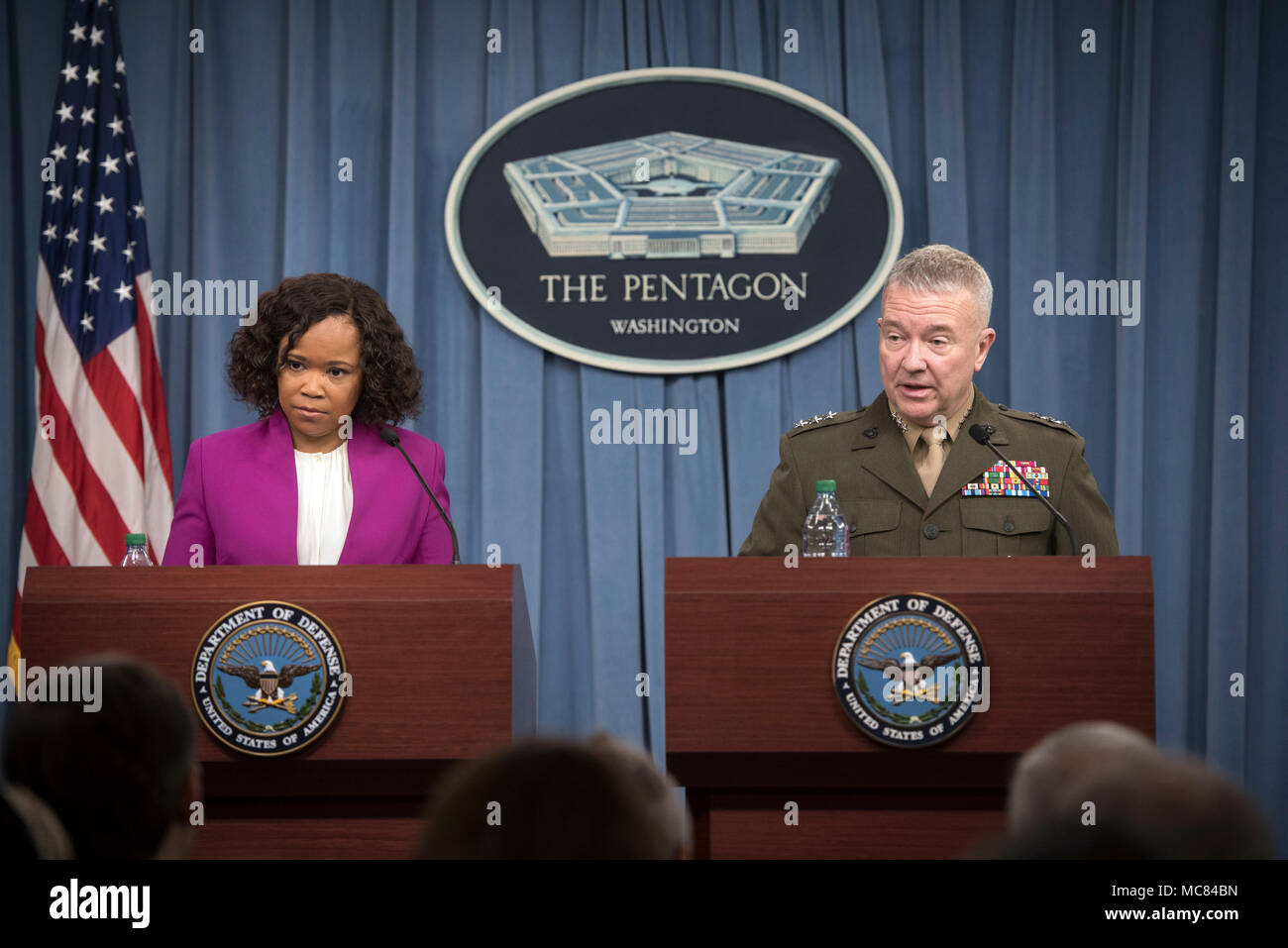 Dana White, the assistant to the secretary of defense for public affairs, and Lt. Gen. Kenneth F. McKenzie, the Joint Staff director, brief the press regarding American operations in Syria at the Pentagon in Washington, D.C., April 14, 2018. (DoD photo by Tech Sgt. Vernon Young Jr.) Stock Photo
