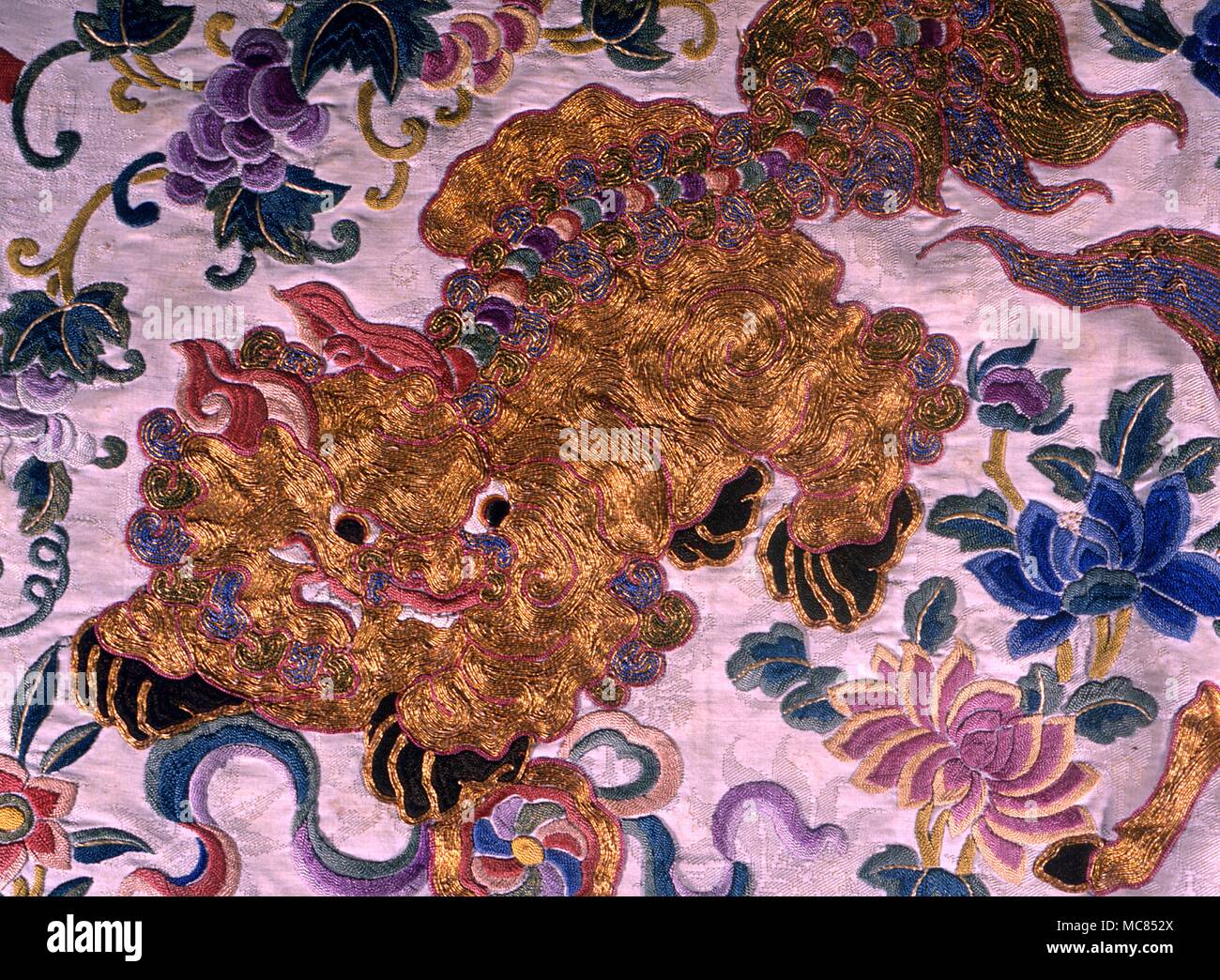 Chinese Mythology The Fu Dog, or dragon dog which acts as guardian. Silken embroidery sheet 19th century Stock Photo