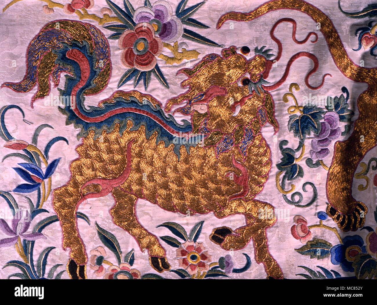 Chinese Mythology The monster composite among Chinese mythological guardians, with hooves of horse, body of lion head of dragon horns of goat Silken embroidery sheet 19th century Stock Photo