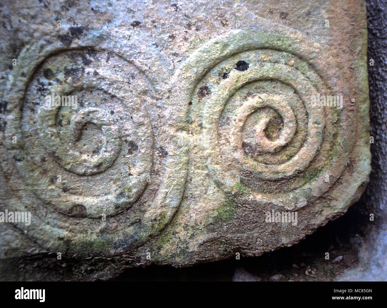 Spirals - Malta. Prehistoric spirals (similar to Celtic spiral work), made circa 3,000 BC, in the Maltese prehistoric temple at Tarxien. Stock Photo