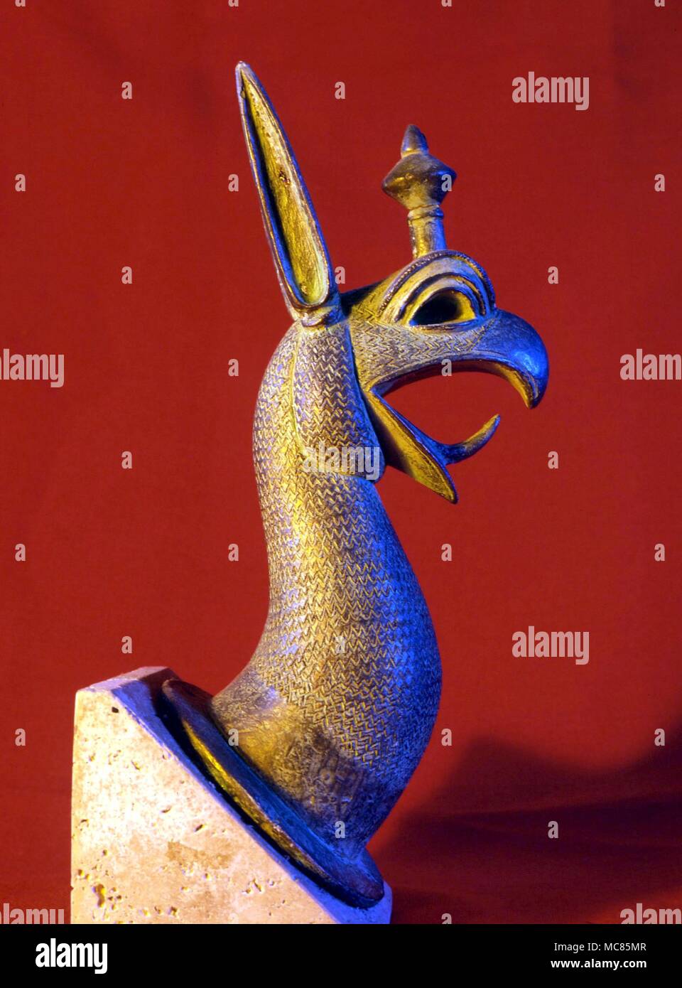 GREEK MYTHOLOGY head of a griffin, based on a 7th cnetury BC Greek original, which formed part of a votive tripod, now in the Museum at Olympia Stock Photo