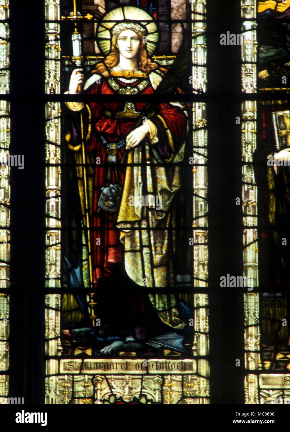 CHRISTIAN St. Margaret of Antioch, stained glass in the north wall of St Margaret's Church, King's Lynn Stock Photo