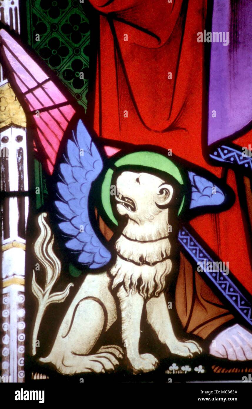 CHRISTIAN Leo the Lion, emblem of St Mark. 19th century stained glass (detail) in the parish church of Kilkhampton Stock Photo