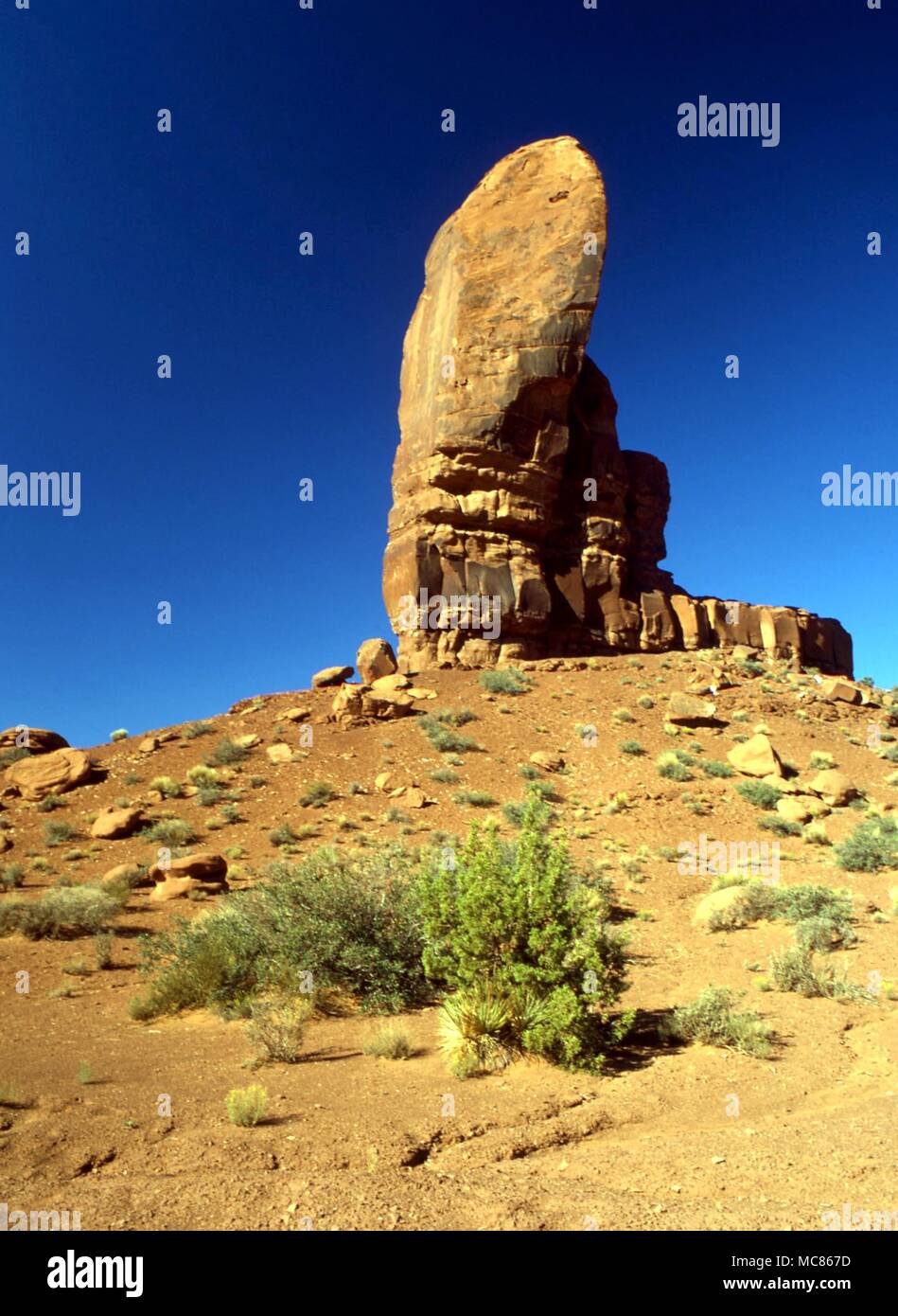 NORTH AMERICAN INDIAN Sacred to the North American Indians were many of the mesas, on to which they insisted the gods first landed when they came to Earth. Monument Valley Stock Photo