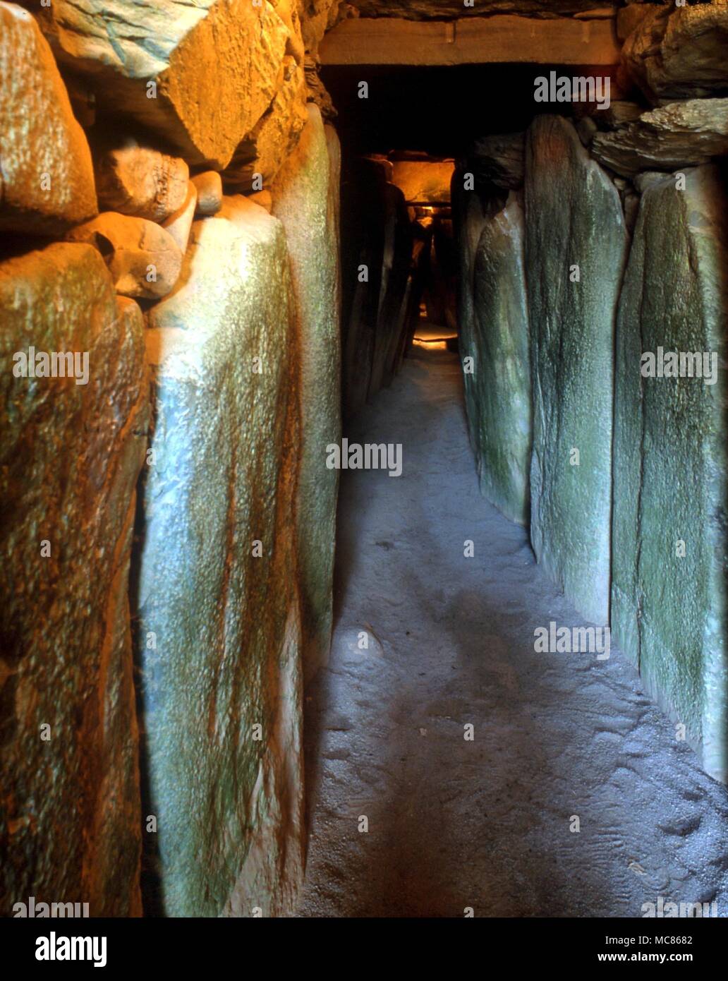 NEWGRANGE (KNOWTH) - Irish Prehistoric Site. About 3,000 BC. The great passageway into the cairn. View from entrance towards back stone Stock Photo
