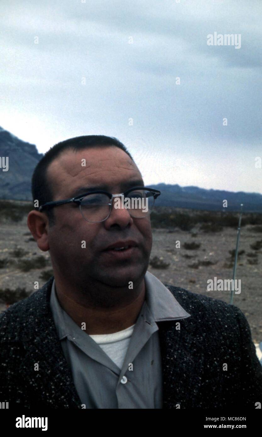UFO - unidentified flying object Lonnie Zamora, New Mexico patrolman, who saw (1964) elliptical ufo with two small aliens, near town of Socorro. Aliens and ufo left traces of burning and footprints. Pictures shows Samora at site Stock Photo