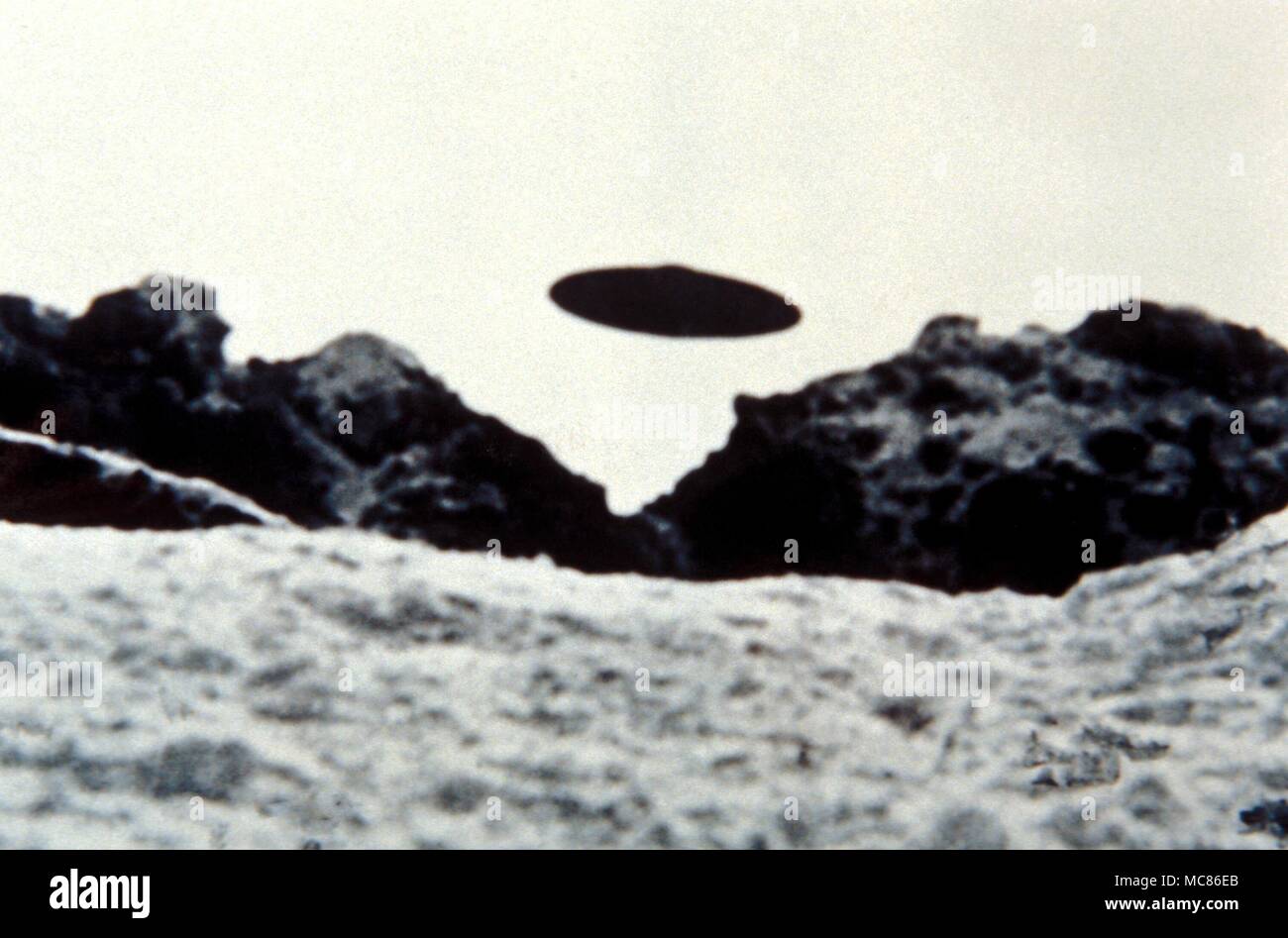 UFO - unidentified flying object photographed at the Bernina Glacier, Italy, on 31 July 1952 by Gampiere Monguzzi. Wendelle Stevens archives, with arrangement with Charles Walker Stock Photo