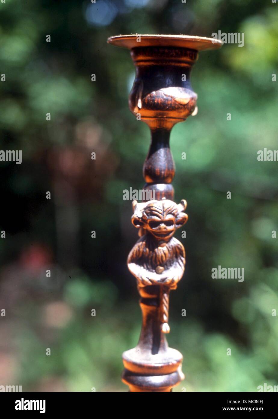 Candleholders with image of the so-called Lincoln demon on stem. This candleholder is used in Wiccan rituals. private collection, Toronto Stock Photo