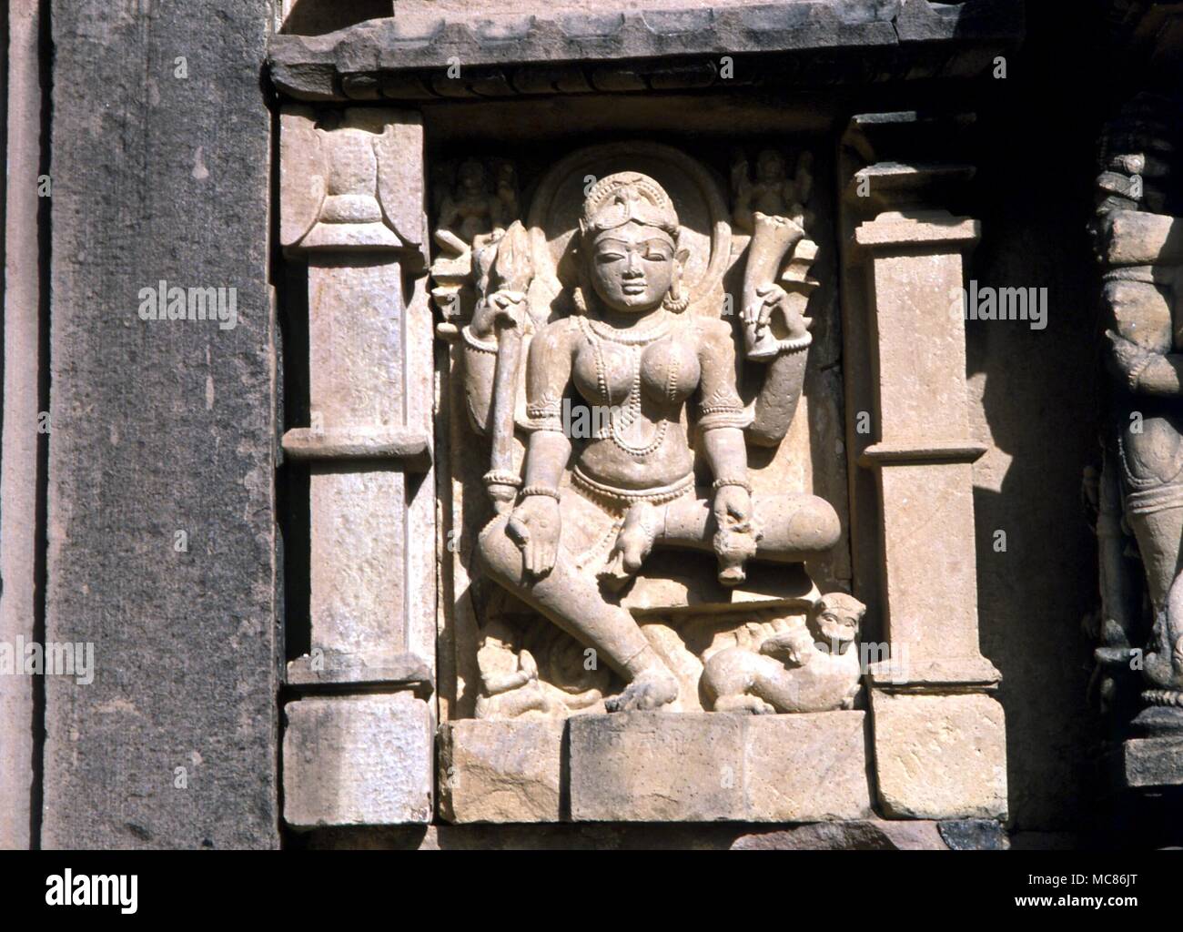 INDIA Yoga pose with four different sacred mudras, or finger gestures. Detail of statuary on the exterior of the Lakshmana Temple at Kahajuraho, dedicated to Vishnu, dated 950 AD Stock Photo