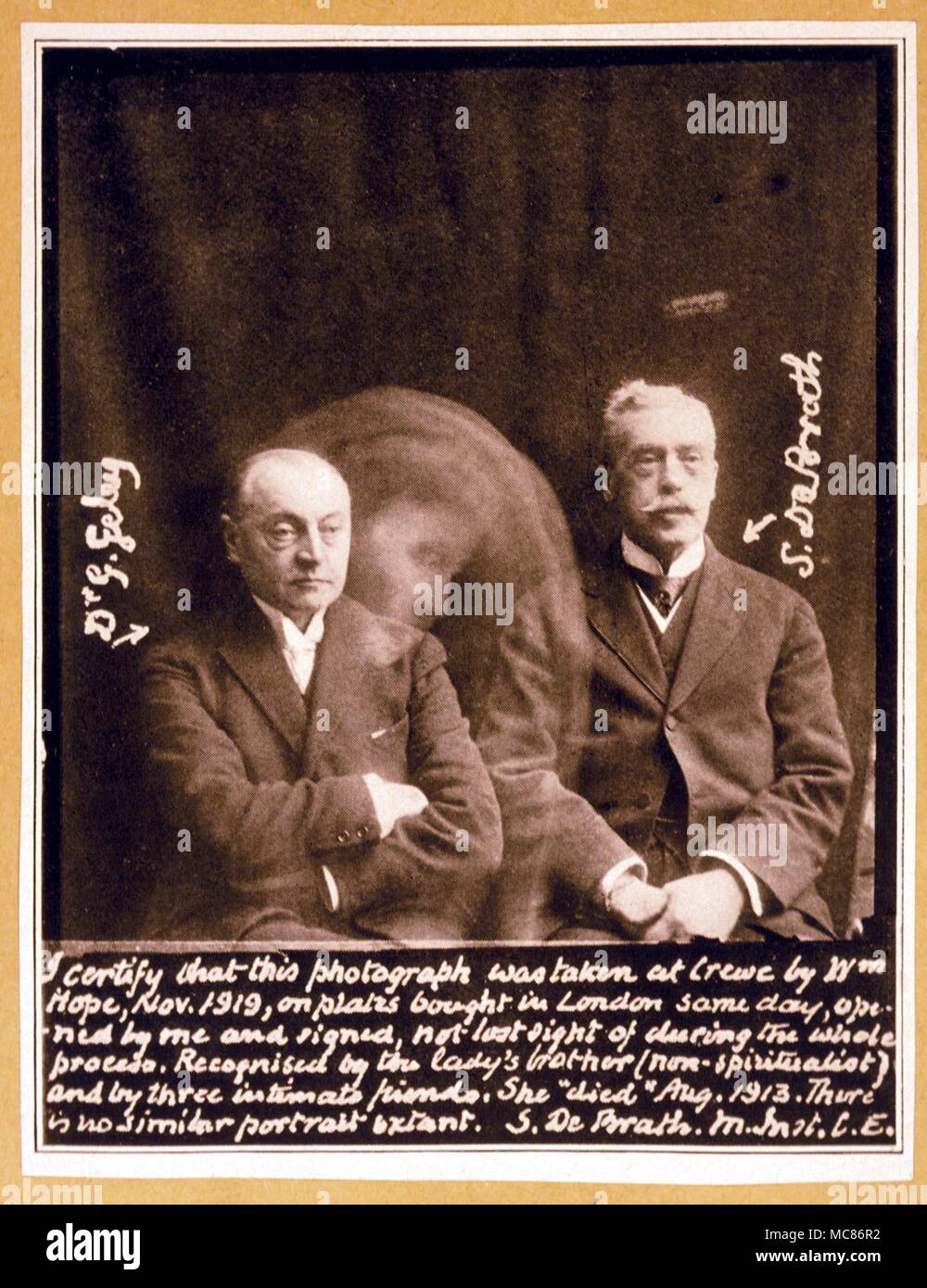 Psychic Phenomena Spirit photograph taken under test conditions with the famous psychic workers, Geley and de Brath by Hope in November 1919. The face of the spirit was recognised as one who had died in 1913 Stock Photo