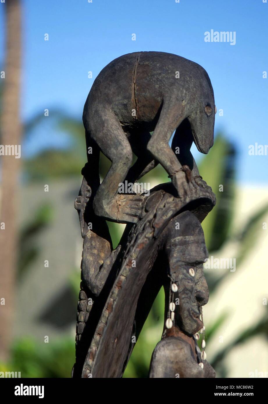 POLYNESIAN MYTHOLOGY Polynesian wooden magical statue of a curious monkey-like mythological creature. private collection, Hawaii Stock Photo