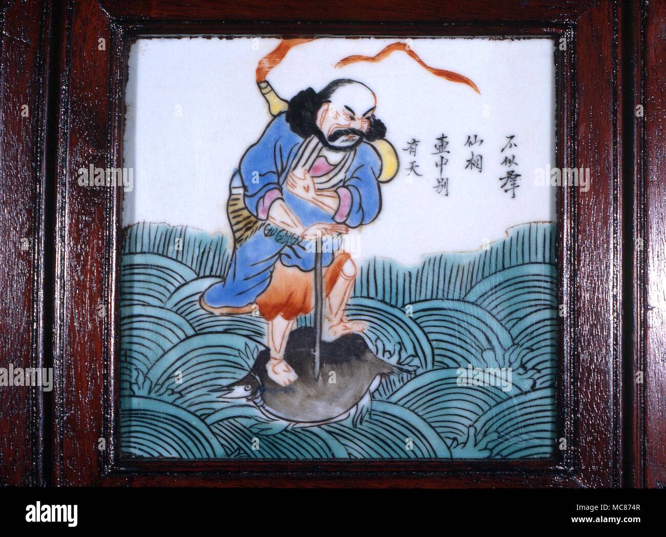 Taoism - One of the Taoist 'Eight Immortals- (Pa Hsien). Li T'ieh-Kuai, who (his body accidentally destroyed in his soul's absence) took the body of a lame beggar. Proficient in magic. Mid-19th century Chinese tile, from a screen Stock Photo