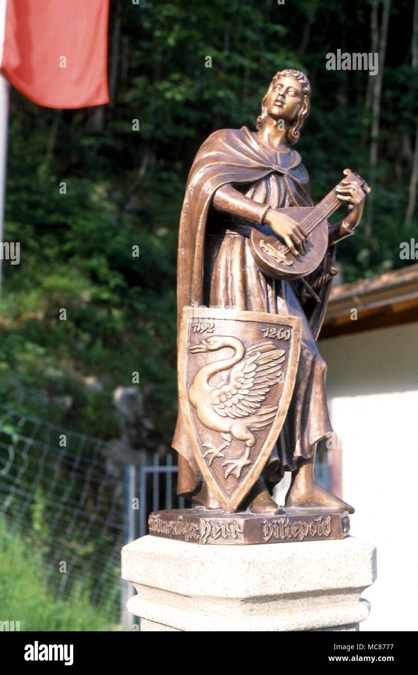 Heraldic swan on bronze statue of musician in the village of Hohenschwangau, Bavaria Stock Photo