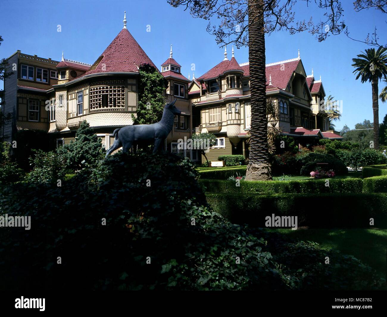 Hauntings - Winchester House, San Jose, California. The owner Sarah Winchester had a seance room constructed in the house. She was convinced by a medium that continuous building would appease the spirits of those killed by the Winchester gun. Stock Photo