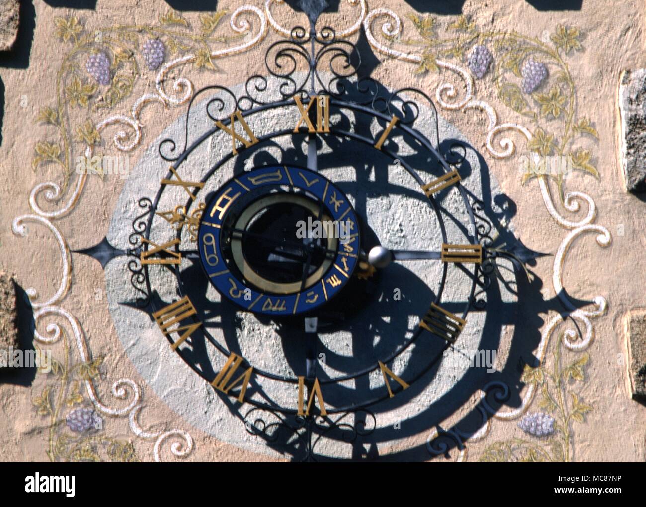 Horlogia and Clocks Zodiacal clock with zodiacal sigils in the mock mediaeval style Disneyworld California Stock Photo