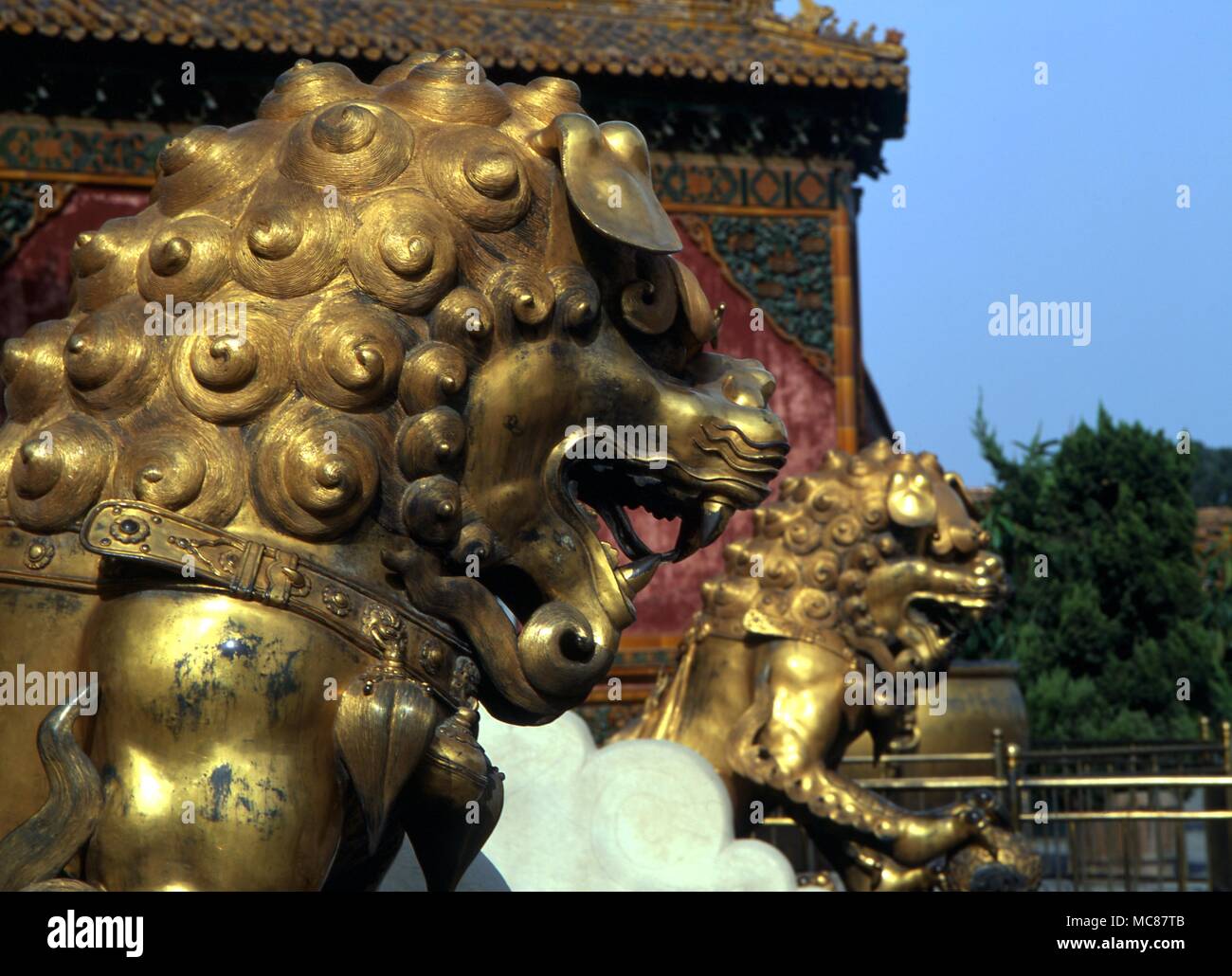 Chinese Mythology The guardian lion with the sacred pearl statue in the Forbidden City Beijing Stock Photo