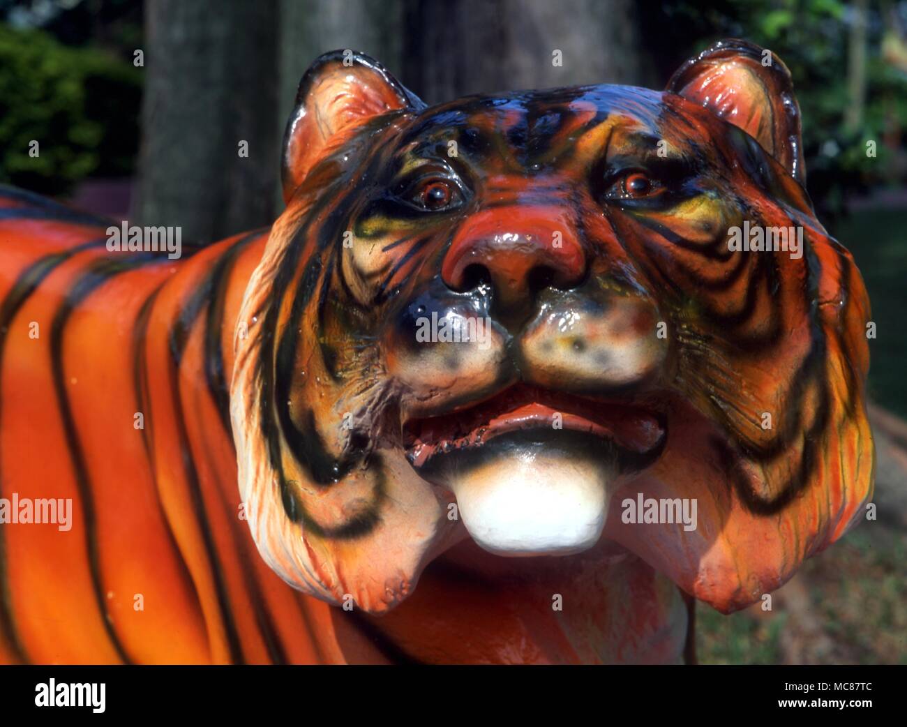 Chinese Mythology The Tiger Head of the Tiger Chinese Mythological subject in Haw Par Villa (Tiger Balm Park) in Singapore Stock Photo