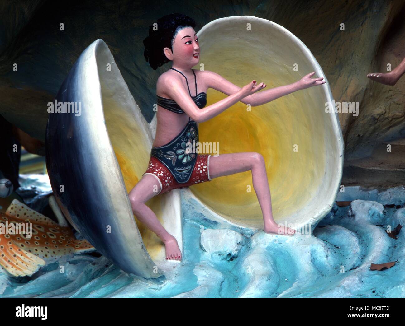 Chinese Mythology Goddess springing from a giant clam shell. Chinese mythological subject in Haw Par Villa (Tiger Balm Park) in Singapore Stock Photo