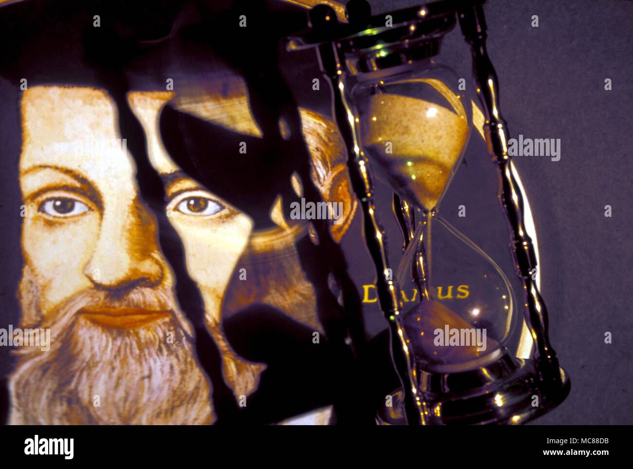 PREDICTIONS AND PROPHECY Fantasy portrait of Nostradamus with hour glass Stock Photo