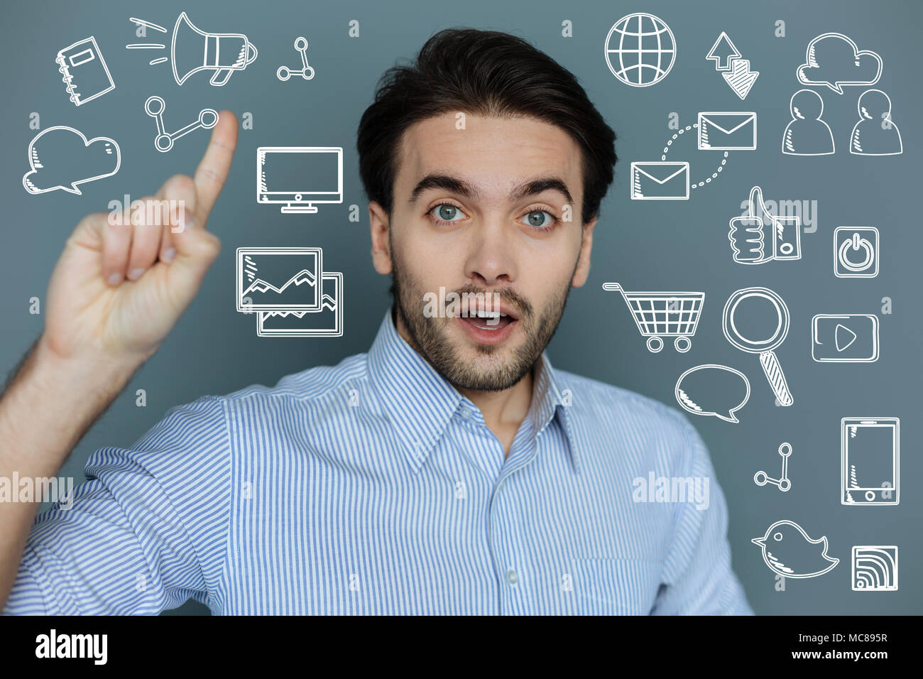 Software engineer putting his finder up while getting an idea Stock
