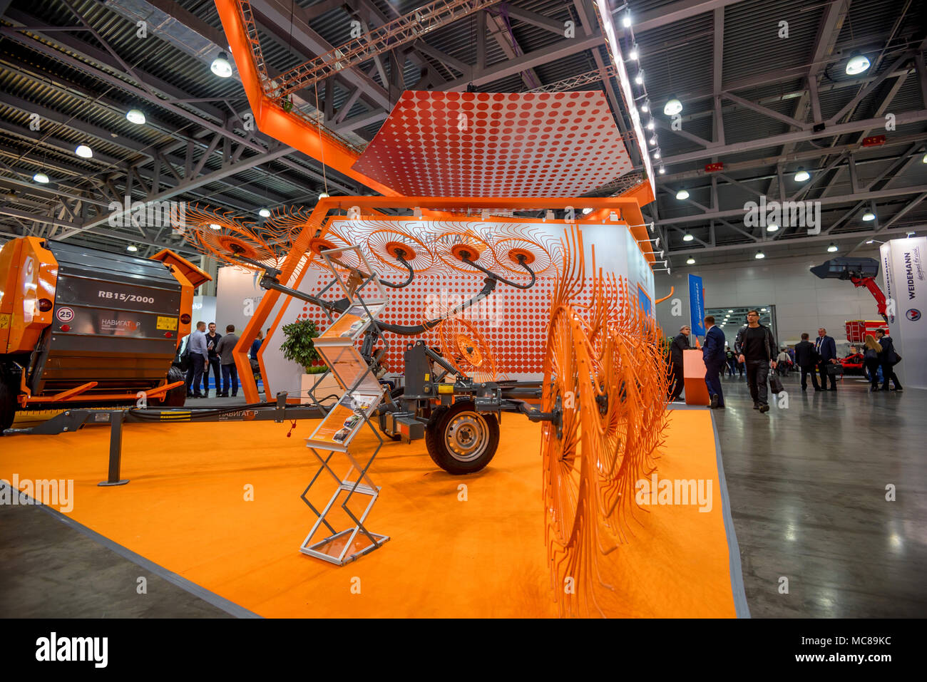 ROSTOV-ON-DON, RUSSIA - OCTOBER 5, 2016: Stand at agricultural exhibition in Rostov-on-Don, Russia with hay rakers for combine. This region offers fav Stock Photo