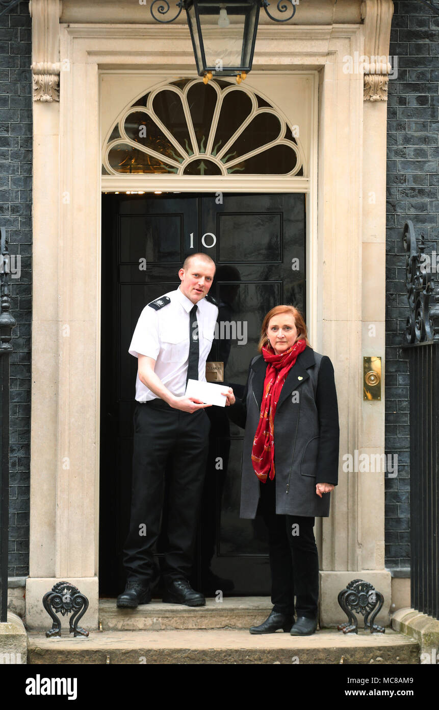 Emma Dent Coad, MP for Kensington, delivering a letter on behalf of Stop the War Coalition - signed by MPs, trade unionists, celebrities and academics to Downing Street urging Theresa May to not take military action in Syria - at 10 Downing Street in London. Stock Photo