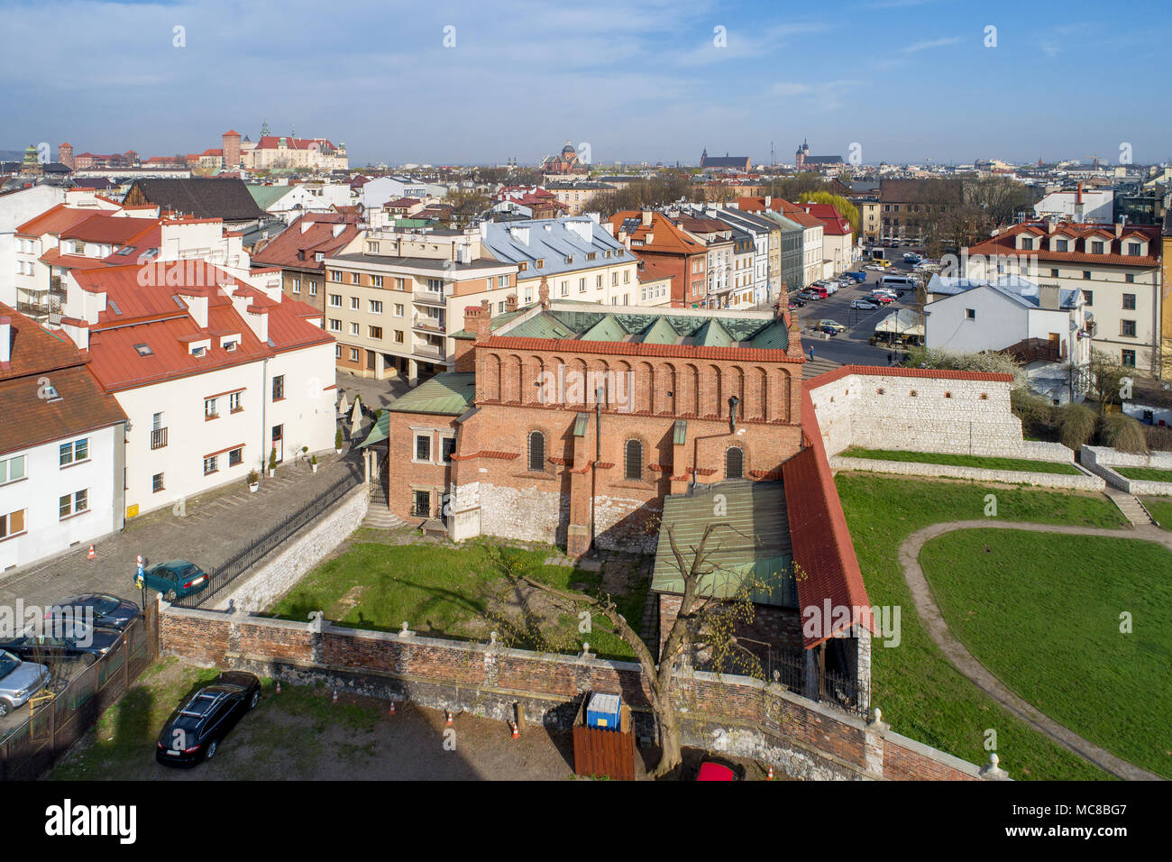 Jewish Kazimierz district in Krakow, Poland,  with Old Synagogue, Szeroka (Wide) Street and far view of Wawel castle, St. Mary church and other church Stock Photo